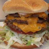 Triple Burger w/ Cheese · (3) 3 oz Patties topped with Cheddar cheese and comes with Lettuce, Tomato and Sloppy Sauce....