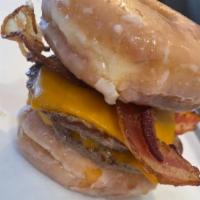 The OMG x 2 · Yes, Seeing Double!  Two 3 oz burger patties, Cheddar cheese and two strips of bacon in betw...