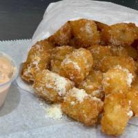 Tater Tots · Delicious Tater Tots lightly sprinkled with salt, pepper & Parmesan Cheese.