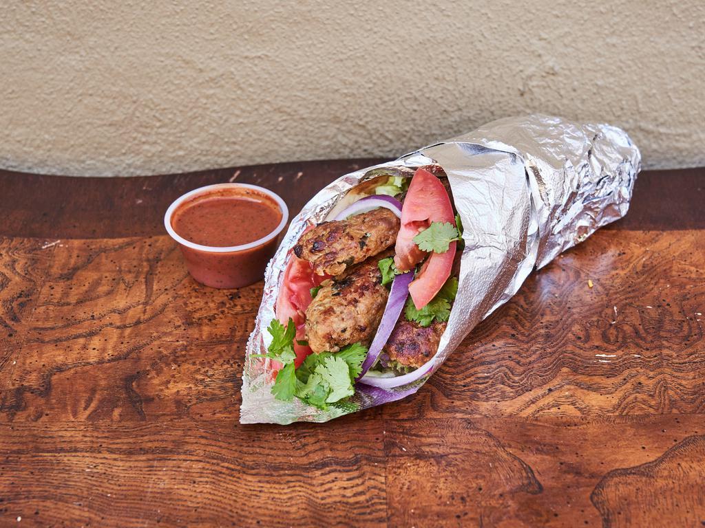 Kofta Kabab Gyro Sandwich · Cooked on a spit and wrapped in a pita.