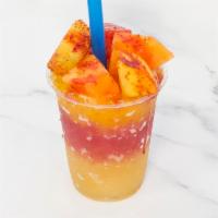Fregonada · Shaved ice with peach, raspberry, mango topped with mixed fruit and chamoy sauce.