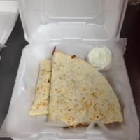 Chicken Quesadilla · Grilled with salsa sauce and wrapped in tortilla with chicken, mozzarella cheese, and chedda...