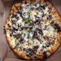 Philly Steak Pizza · Garlic herb sauce, mozzarella cheese, grilled steak, mushrooms, green peppers and red onions.