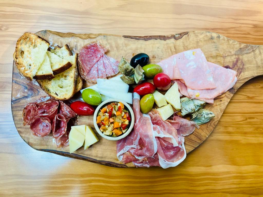 Italian Meat and Cheese · Artisanal salumi, assorted cheese, marinated olives and crostini.