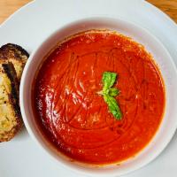 Pappa e Pomodoro Soup · Tuscan style tomato soup, garlic ciabatta bread and olive oil.