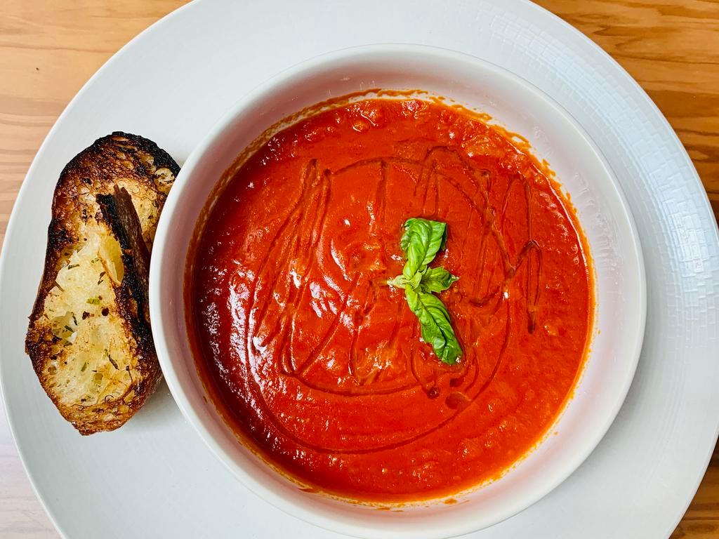 Pappa e Pomodoro Soup · Tuscan style tomato soup, garlic ciabatta bread and olive oil.