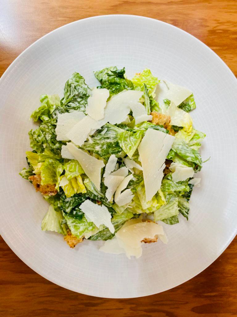 Caesar Salad · Rromaine hearts, Parmesan dressing and garlic croutons. Add chicken or shrimp for an additional charge.