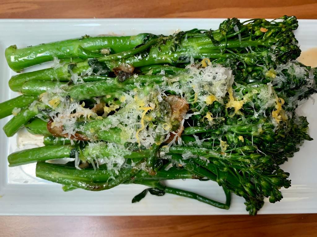 Sauteed Broccolini · Garlic, lemon and Parmigiano.