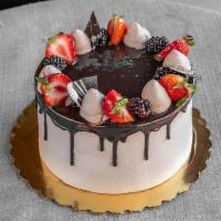 Ensueno Cake · Chocolate sponge cake filled with Dulce de Leche and fresh Chantilly cream.