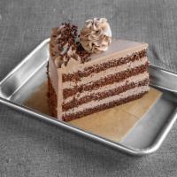 Chocolate Mousse Slice · Rich chocolate sponge cake filled with two layers of extra creamy chocolate mousse.