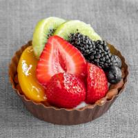Fruit tart 4' · Smooth,made-from-scratch pastry cream topped with fresh strawberries, kiwi,blueberries and b...