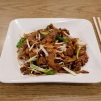 Beef chow fun 干炒牛河 · Stirred fried flat chow fun noodles with beef onions sprouts