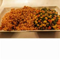 Khadijah Wheat · Bulgur Wheat mixed in rich tomato and red pepper base sauce with onions and spices, to creat...