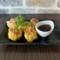Thai Shrimp and Chicken Dumpling · Steamed of fried minced chicken and shrimp with mushroom, water chestnuts wrapped in wonton ...