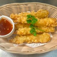 Tempura Shrimp  · Golden fried shrimp dipped in batter with sweet chili sauce.
