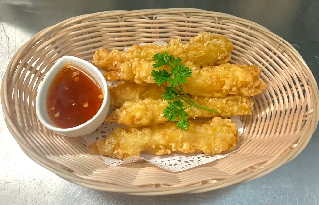 Tempura Shrimp  · Golden fried shrimp dipped in batter with sweet chili sauce.