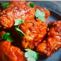 Fried Chicken Wing  · Choice of plain, BBQ and thai spicy for an additional charge.