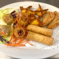 Chill' d Combo  · A combination plate of curry puffs, crab Rangoon, thai dumpling, spring rolls and money bag.