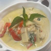 Green Curry · Green chili paste with eggplants, bamboo shoot, fresh basil and bell peppers simmered in coc...