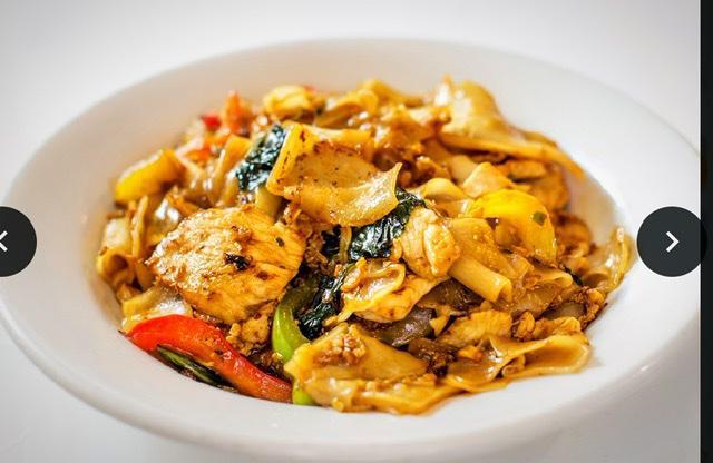 Drunken Noodles  · Broad falt noodles stir fried in spicy soy sauce with onions, fresh chili, bell peppers, fresh basil and egg. Spicy.