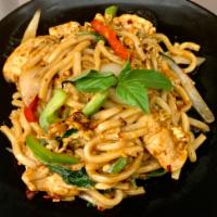 Udon Drunken Noodle  · Stir fired udon in spicy sauce in onions, fresh chili, bell peppers, fresh basil and egg. Sp...