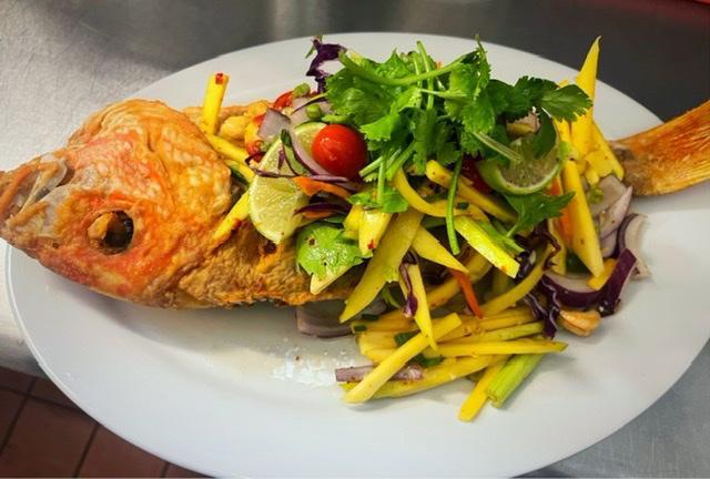 Whole Red  Snapper  · Deep fired whole red snapper with choic of basil sauce, 3 flavor sauce and mango salad.