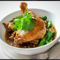 Duck Noodle Soup · Braised 1/2 duck with aromatic 5 spicy soup, bean sprouts and Chinese broccoli.