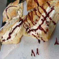 Raspberry Fresh Cream Turnover · Fresh cream and raspberry sauce in a puff pastry turnover
