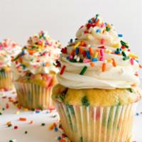 Party Time · A fluffy moist vanilla and sprinkle based cupcake accompanied by a whipped vanilla buttercre...
