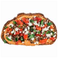 The GOAT Toast · Italian golden panini toast, Roasted Red Pepper Hummus, Olive Tapenade, Crumbled Goat Cheese...