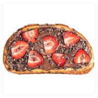The Gigi Toast · Italian golden panini toast, Nutella, strawberry, cocoa nibs.