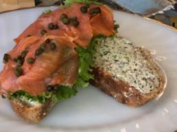 Norwegian Sandwich · Smoked salmon, lettuce, capers, scallion, dill cream cheese, and lemon juice. Served on a fr...
