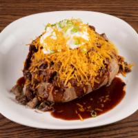 Chopped Beef Baked Potato · Chopped beef and baked potato with butter, sour cream, cheese, chive, BBQ sauce.