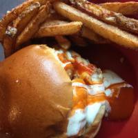 Buffalo Chicken Sandwich · Hot or mild, cheese mix, ranch or blue cheese. Served with fries, tator tots or chips.