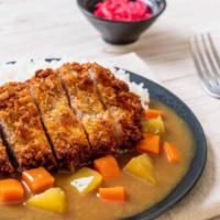 Pork Katsu Curry · Freshly battered pork with panko fried to a crisp perfection served with curry, cabbage, and...