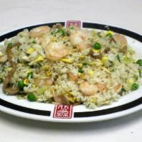 Dynasty Fried Rice · Combination fried rice with chicken, pork, shrimp, vegetable and egg.