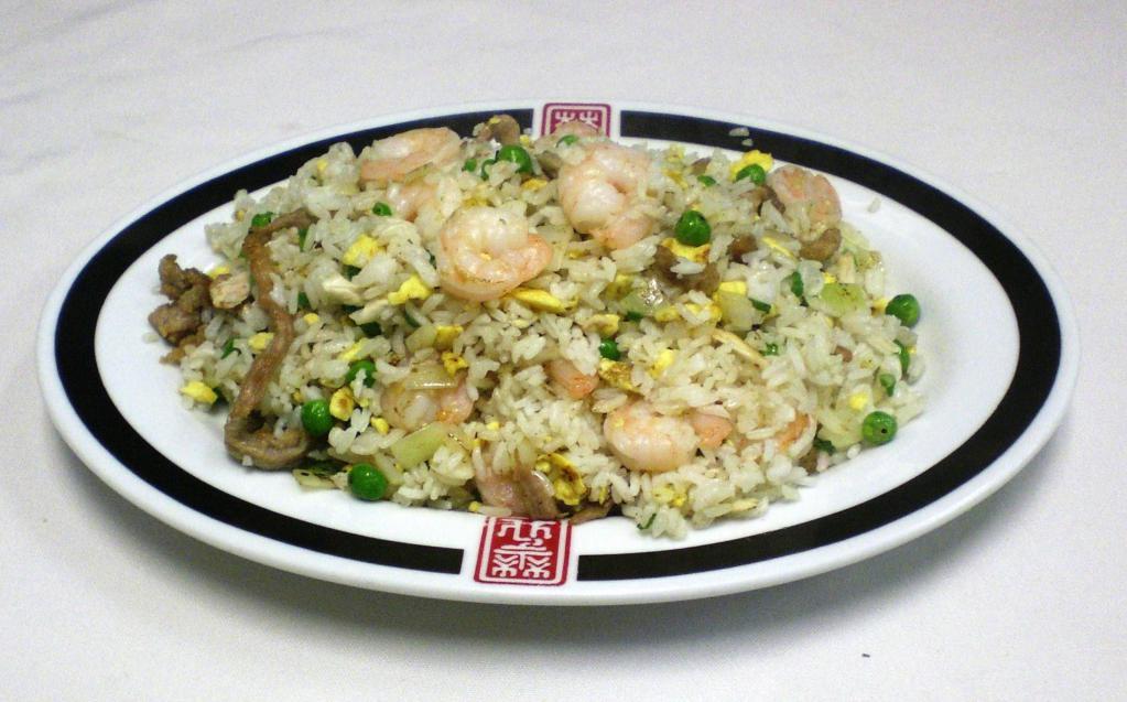Dynasty Fried Rice · Combination fried rice with chicken, pork, shrimp, vegetable and egg.