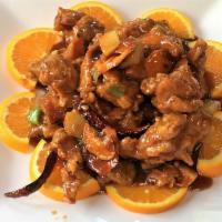 Chicken with Orange Flavor · Fried chicken chunks, orange peel and ginger sauteed in specially made brown sauce. Hot and ...
