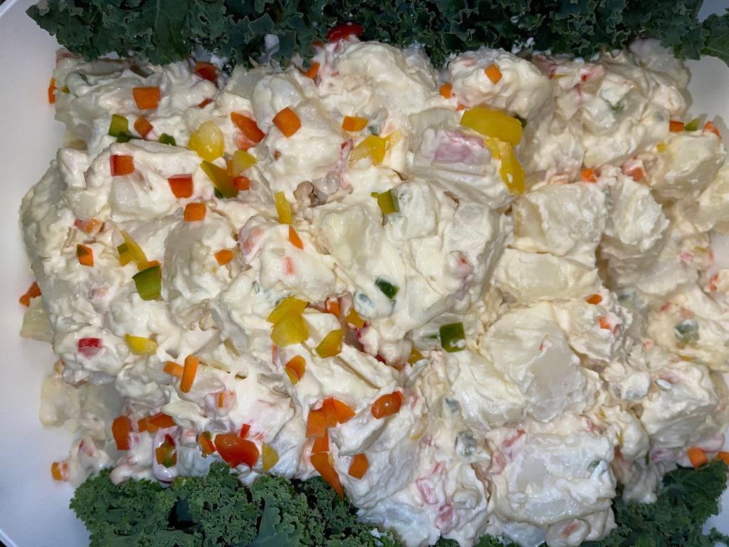 Homemade Potato Salad platter · Cold dish made from seasoned poatoes. 
