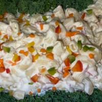 Homemade Macaroni Salad platter · Cold pasta salad made with macaroni noodles.