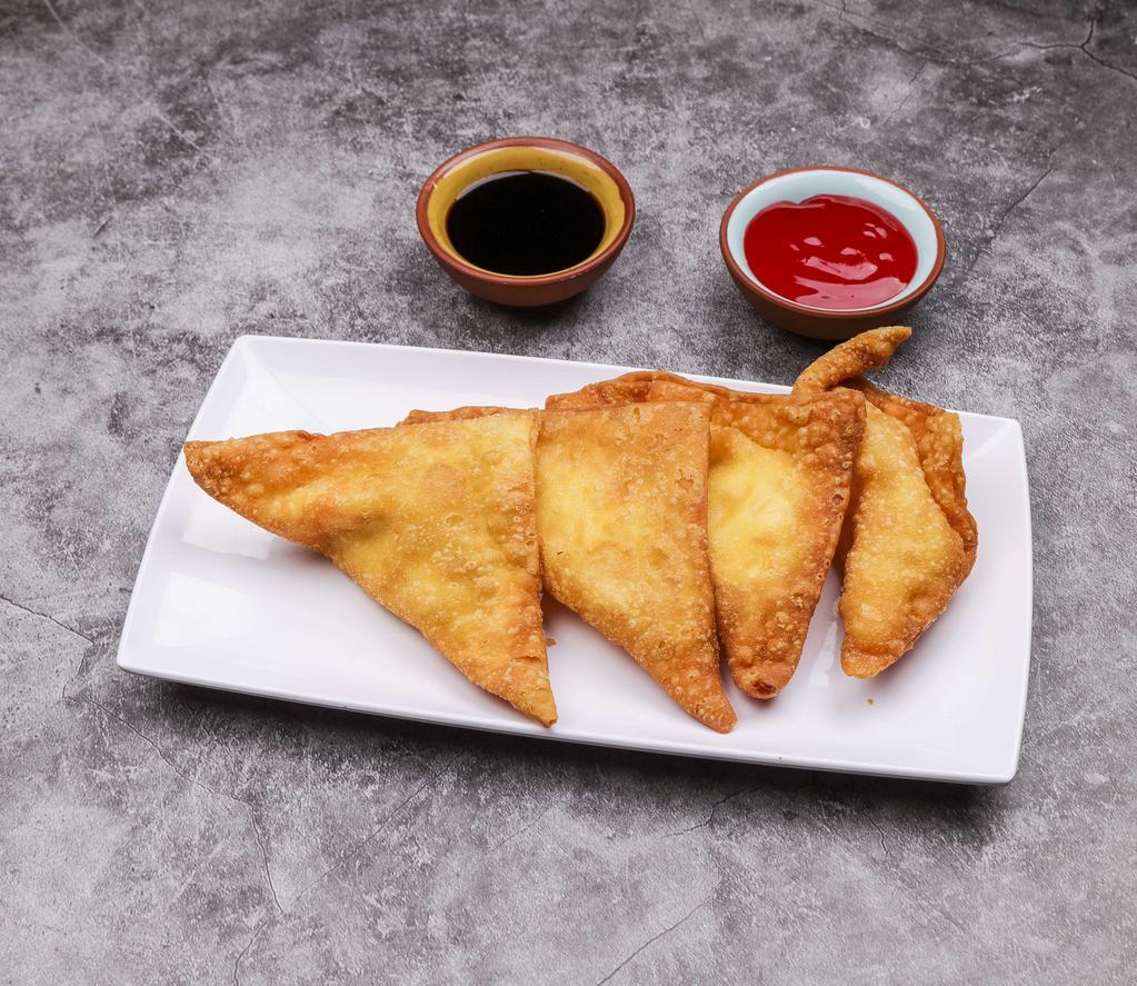 4 Piece Crab Rangoon · Crab meat and cream cheese-stuffed dumplings and fried. 