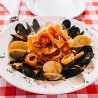 Seafood Marcellino · Filet of sole, mussels, clams, shrimp and calamari served over linguini with marinara sauce.
