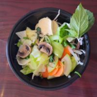 9. Vegetarian Noodle Soup  · Seasoned soy protein, cabbage, Asian squash, mushroom, boy choy with vegetable broth. 