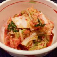 Kimchi · Korean style spicy pickled Asian cabbage.