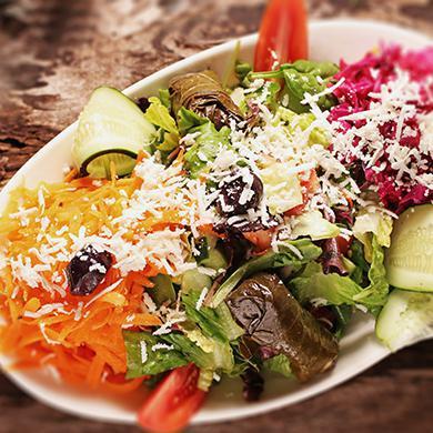 Mediterranean Salad · Fresh tomato, lettuce, green pepper, kirby topped with feta cheese, herbs, olive oil and lemon juice. Add chicken doner, lamb doner, falafel for an additional charge.