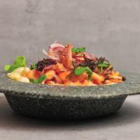 Seafood Ceviche  · selected fresh seafood made in an authentic Peruvian flavor, in a cream of rocoto aji, tiger...