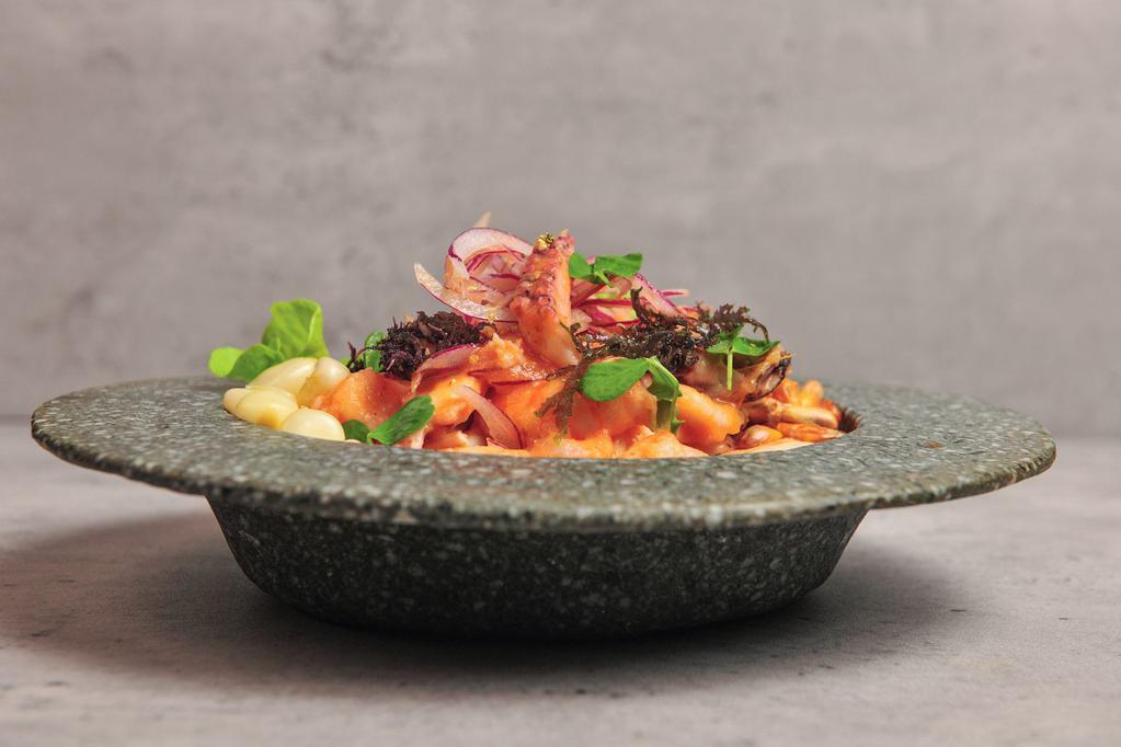 Seafood Ceviche  · selected fresh seafood made in an authentic Peruvian flavor, in a cream of rocoto aji, tiger's milk, Andean corns, sweet potatoes