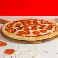 Vegan Forbes Pizza · Red pie, plant-based mozzarella, plant-based pepperoni, and fresh basil.