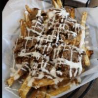 Titan Fries · Homemade French fries topped with feta and mozzarella cheese. Gyro meat and ranch dressing. 