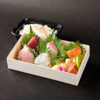 Chirashi · 6 pieces of Sashimi w/ a side of rice Edamame, Miso Soup, and Salad Included